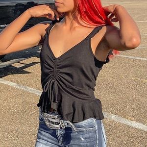 black sleeveless cinched top